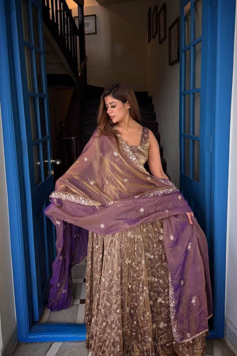 Captivating Dance in Rich Purple Dress