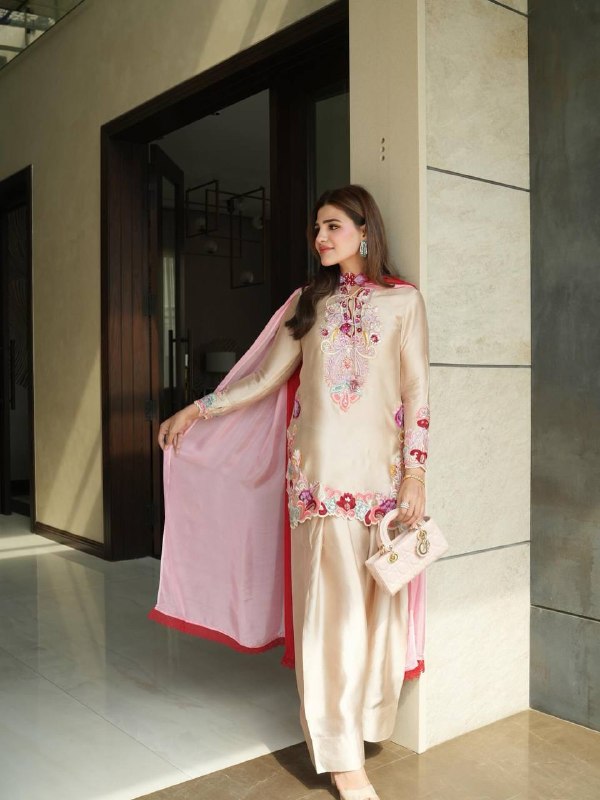 Timeless Beauty in Striking Ensemble