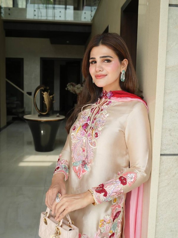 Timeless Beauty in Striking Ensemble