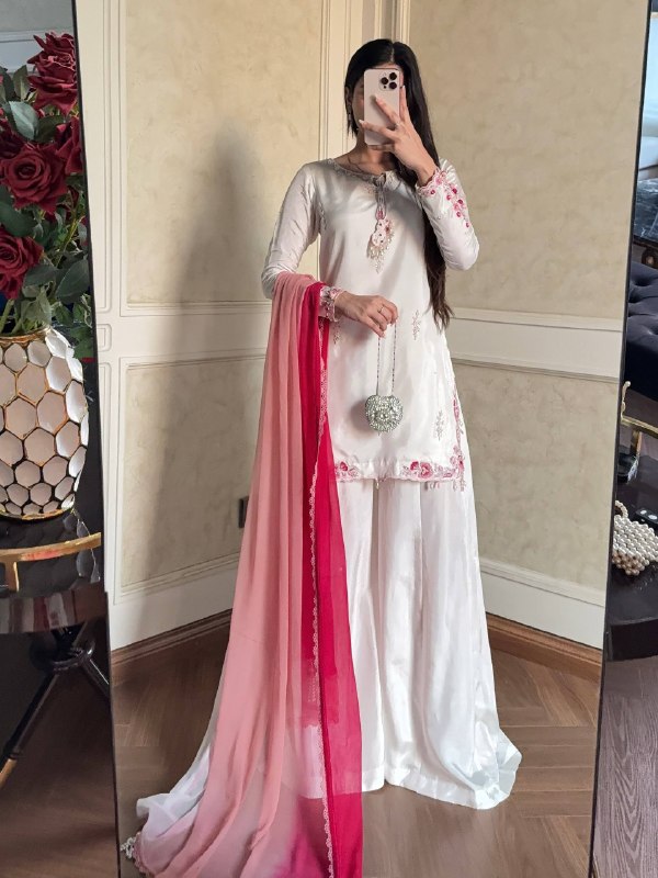Embroidered white suit with pink dupatta