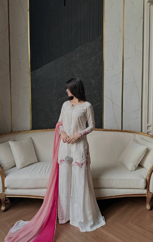 Embroidered white suit with pink dupatta