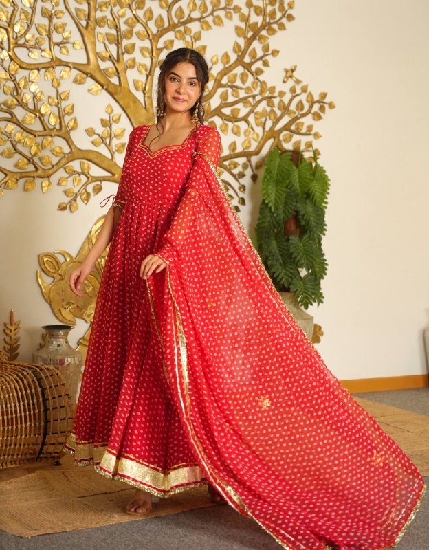 Graceful Indigo Anarkali Dress Adorned with Gold
