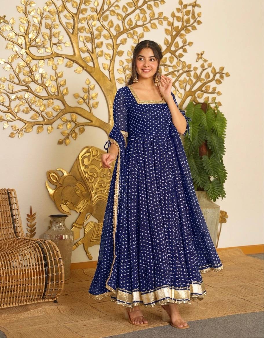 Graceful Indigo Anarkali Dress Adorned with Gold