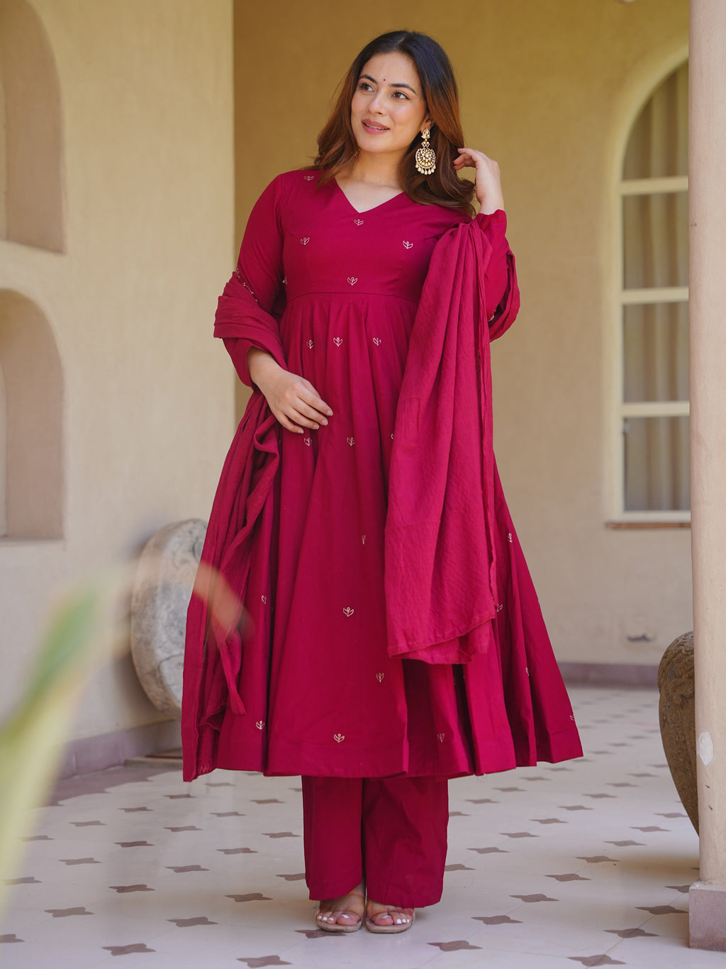Woman wearing elegant traditional Anarkali suit