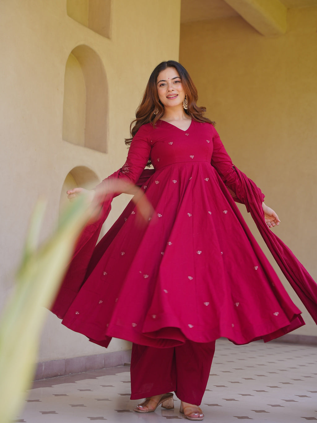 Woman wearing elegant traditional Anarkali suit