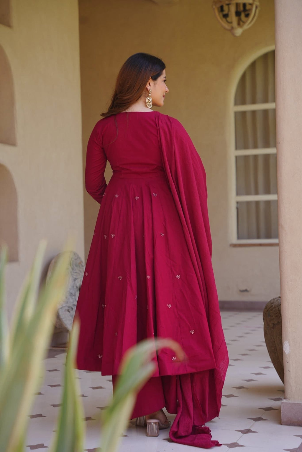 Woman wearing elegant traditional Anarkali suit
