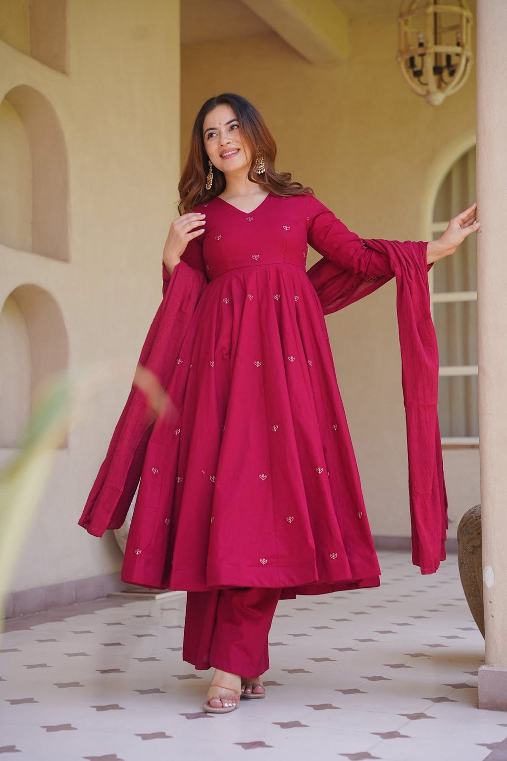 Woman wearing elegant traditional Anarkali suit