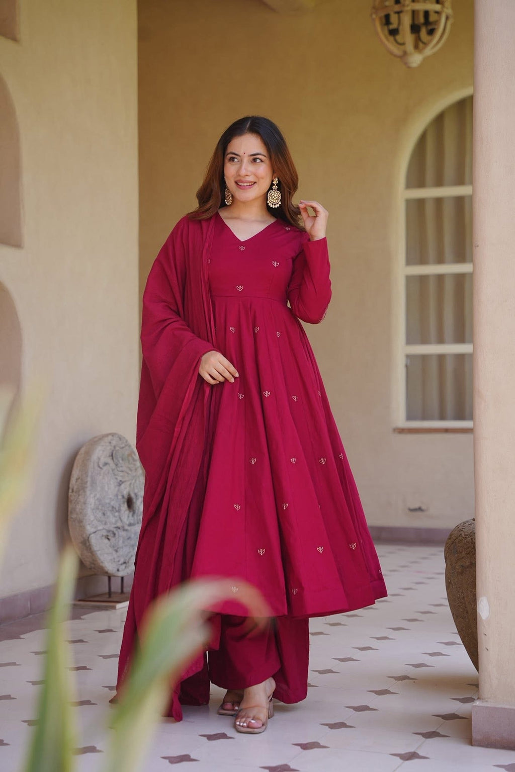 Woman wearing elegant traditional Anarkali suit