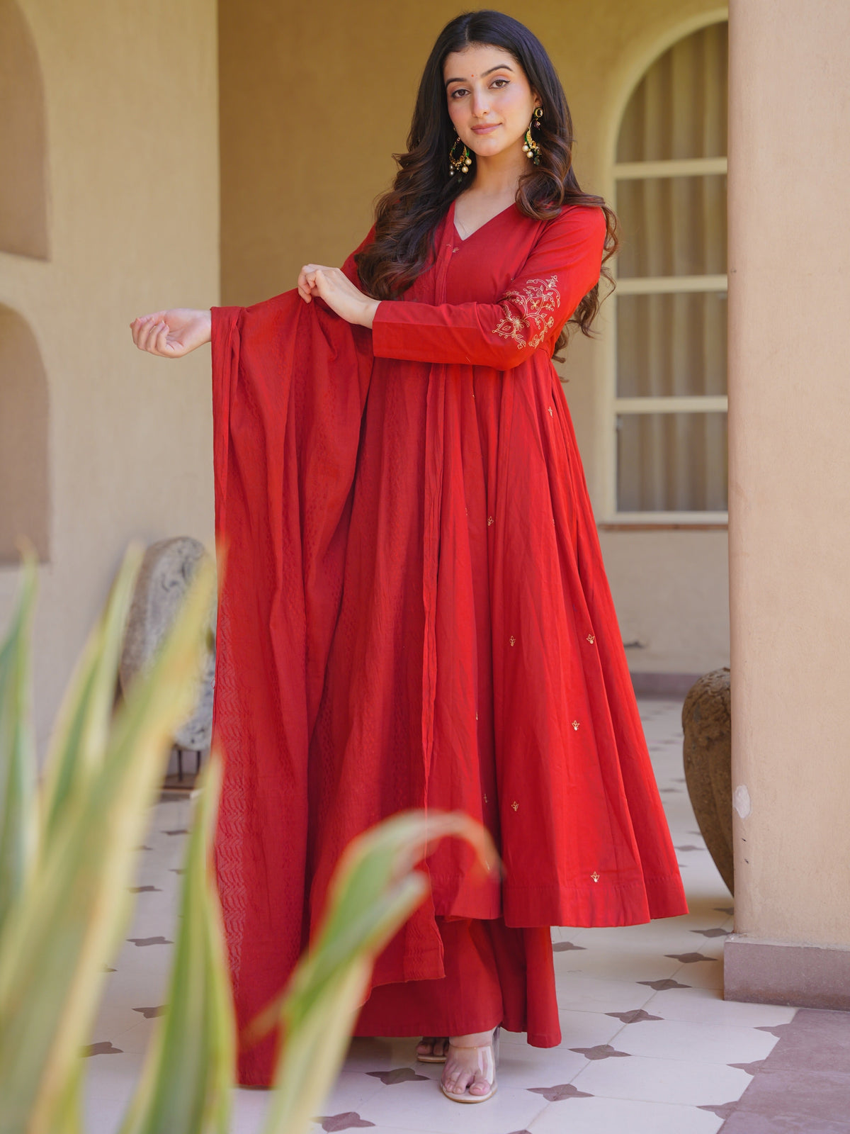 Woman wearing elegant traditional Anarkali suit