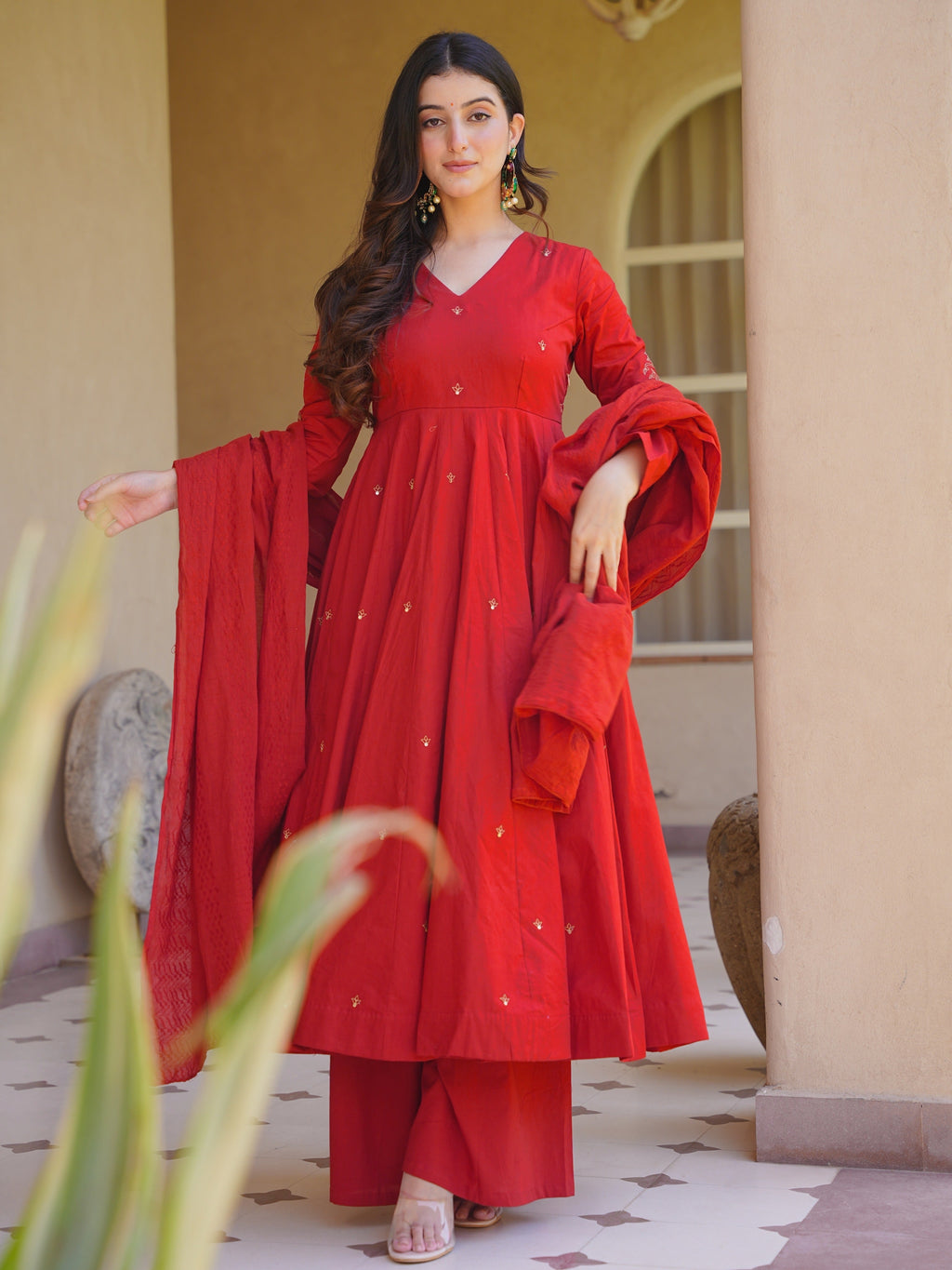 Woman wearing elegant traditional Anarkali suit