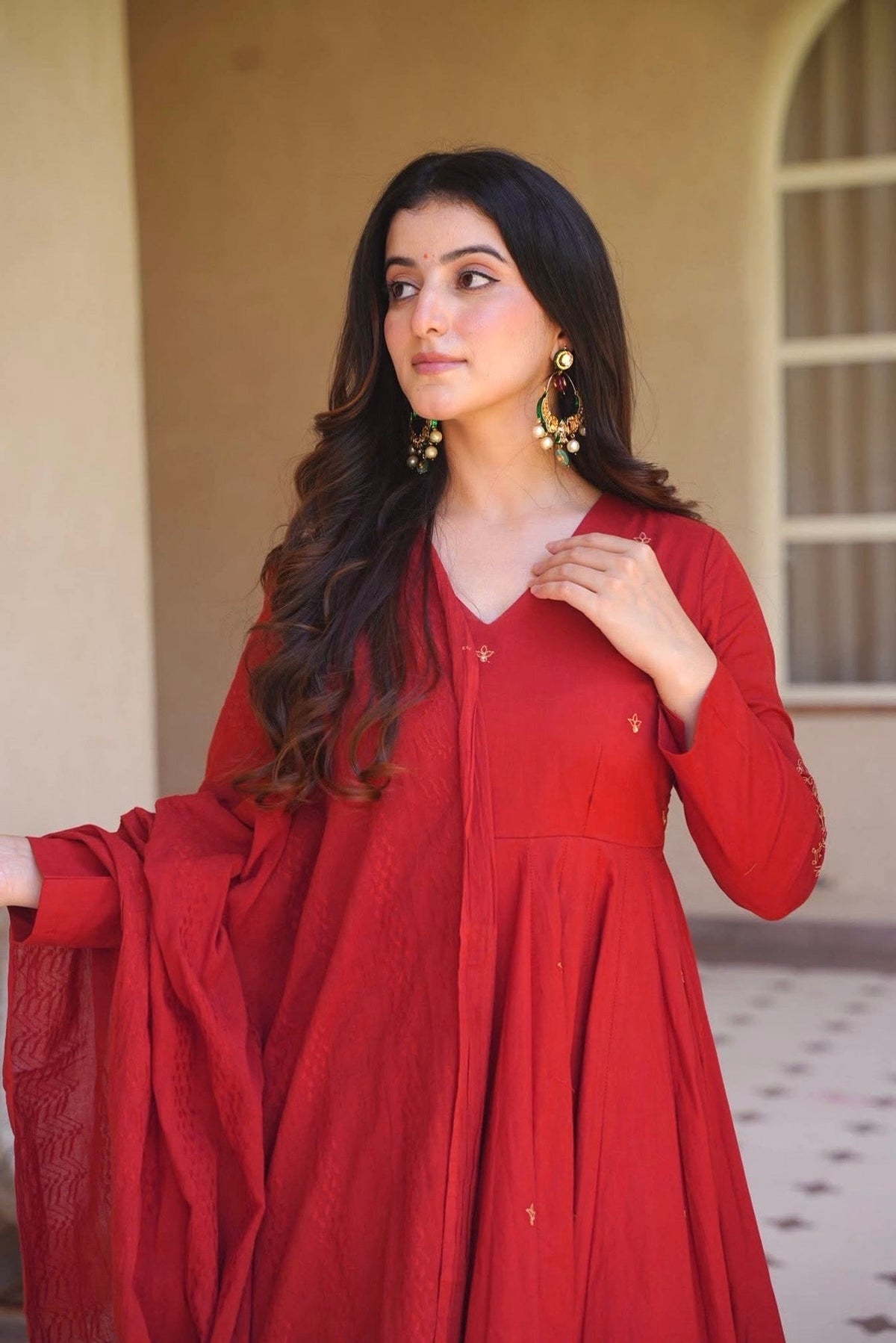 Woman wearing elegant traditional Anarkali suit