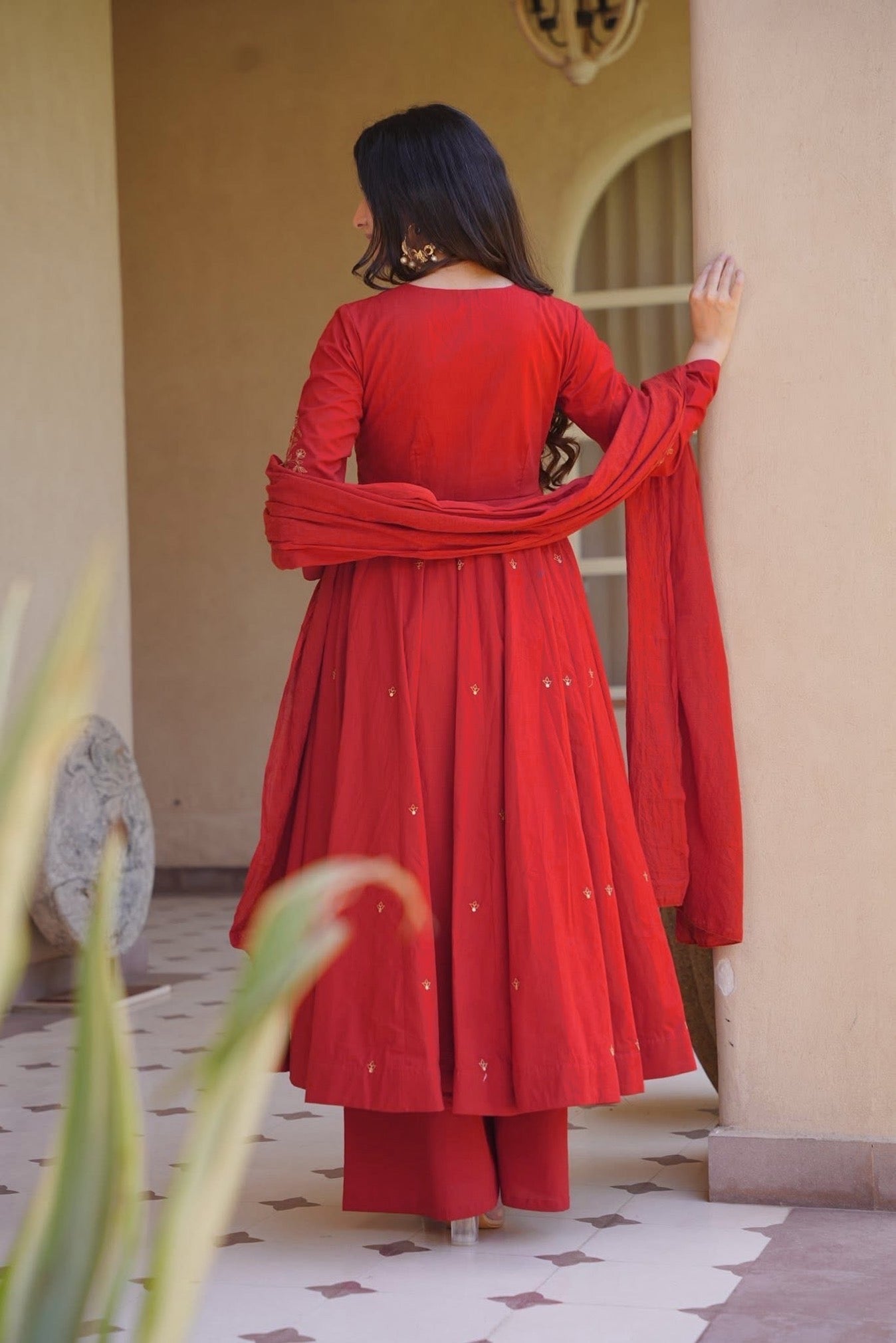 Woman wearing elegant traditional Anarkali suit