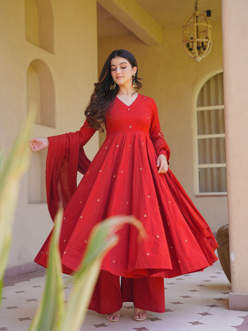 Woman wearing elegant traditional Anarkali suit