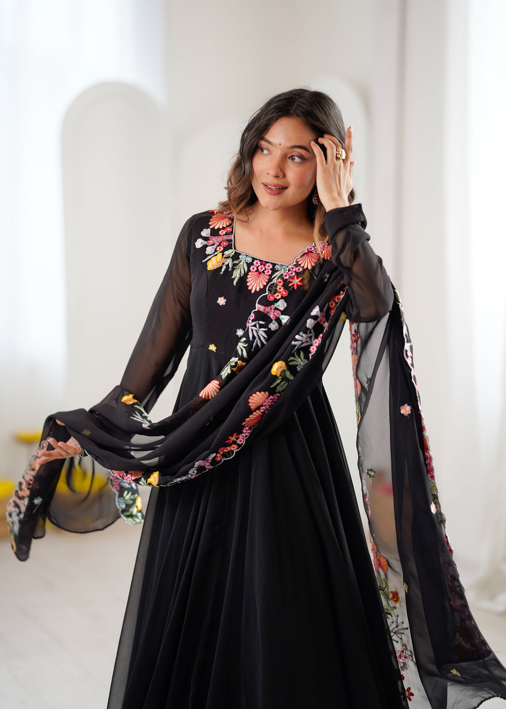 Black Anarkali suit with colorful embroidery