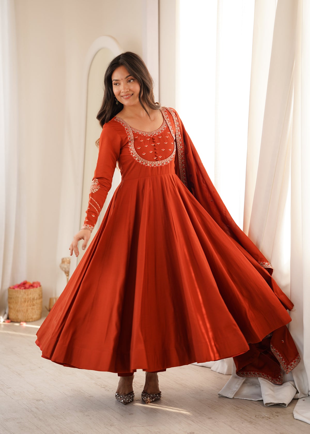 Bold Beauty Posing in Orange Elegance