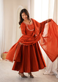 Bold Beauty Posing in Orange Elegance