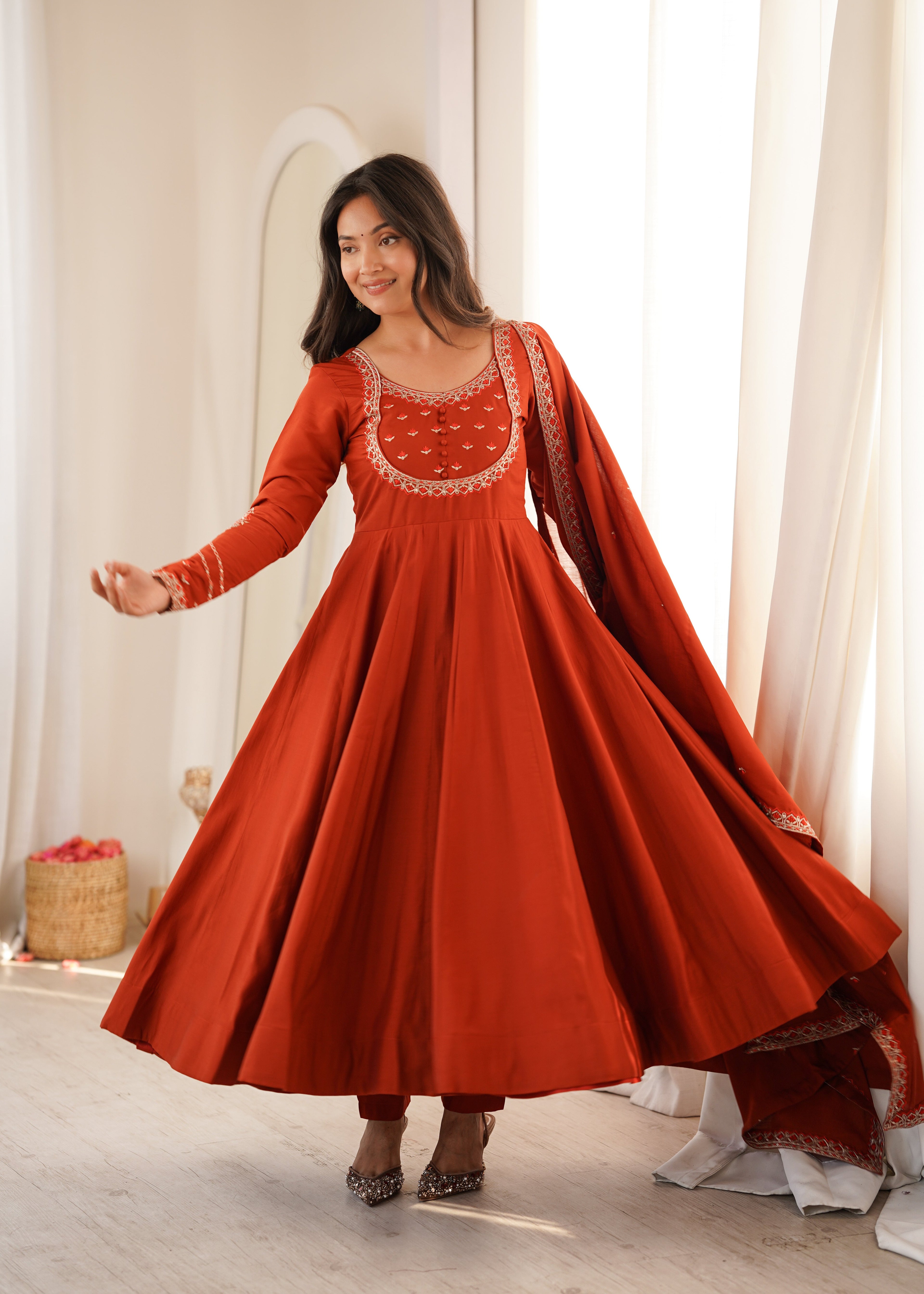 Bold Beauty Posing in Orange Elegance